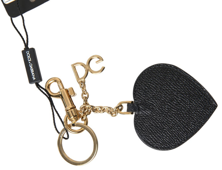 Elegant keychain made of black leather with fuchsia accent