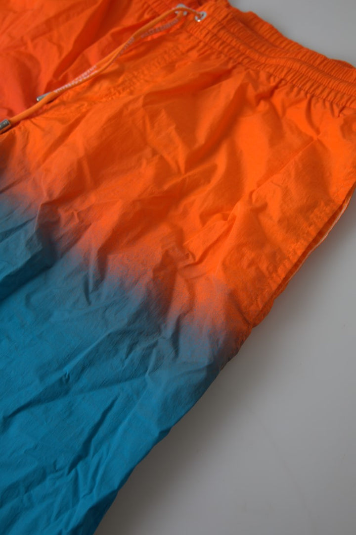 Swim shorts with gradient effect in bright orange