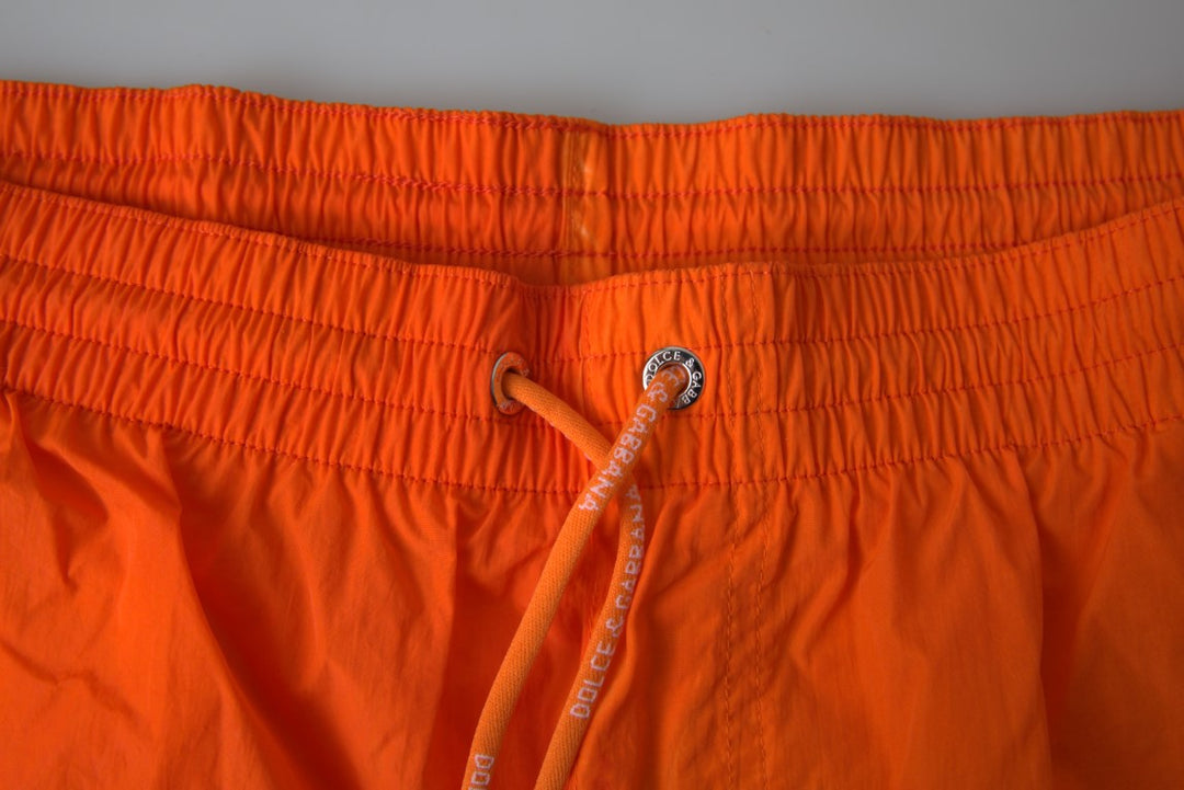 Swim shorts with gradient effect in bright orange