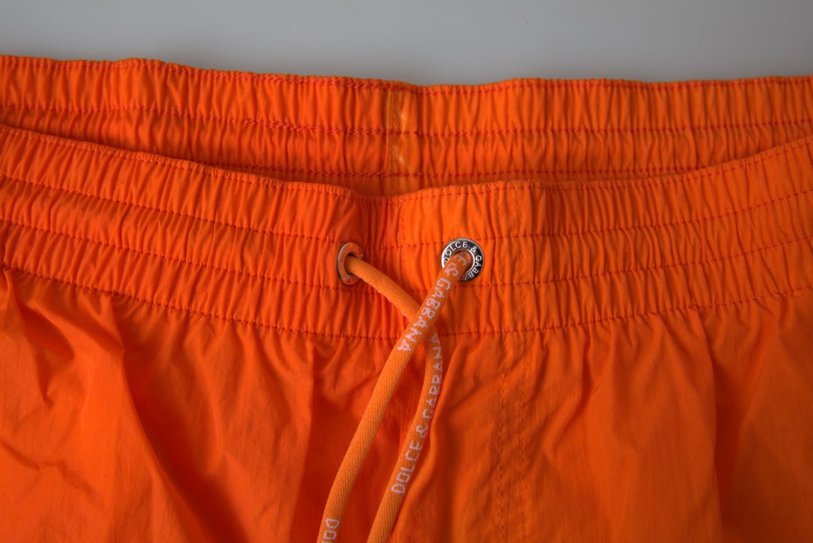 Swim shorts with gradient effect in bright orange