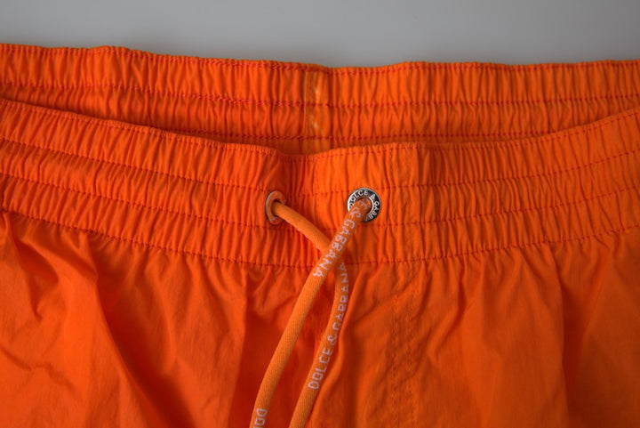 Swim shorts with gradient effect in bright orange