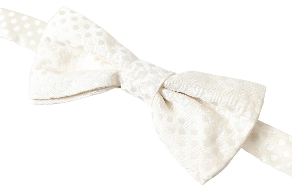 Elegant ivory silk bow tie with fantasy pattern