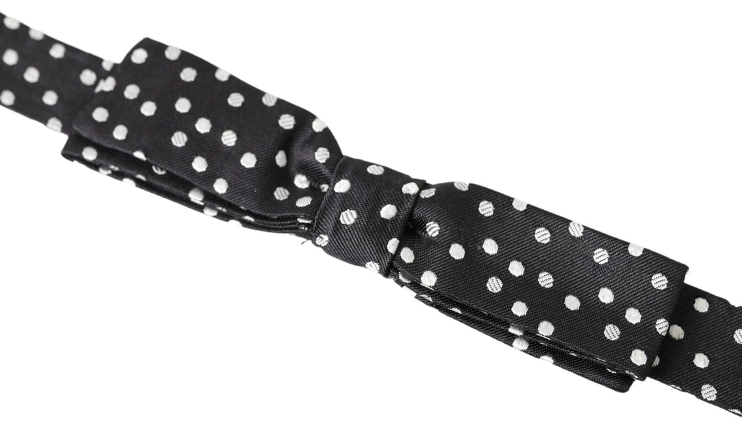 Elegant black silk bow tie with logo detail