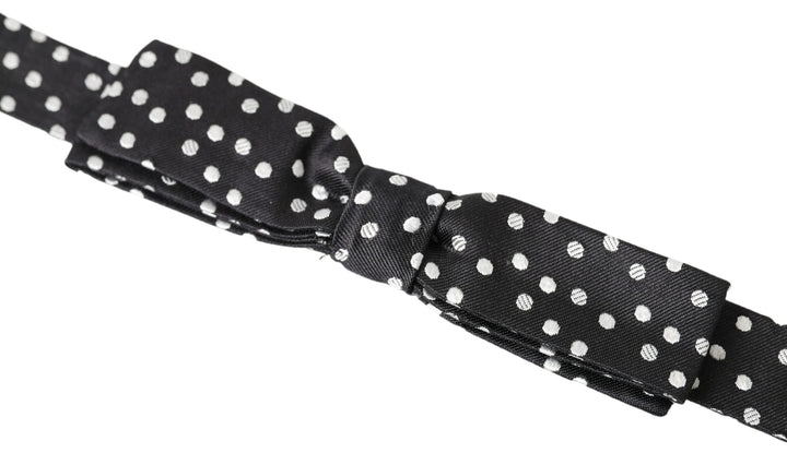 Elegant black silk bow tie with logo detail