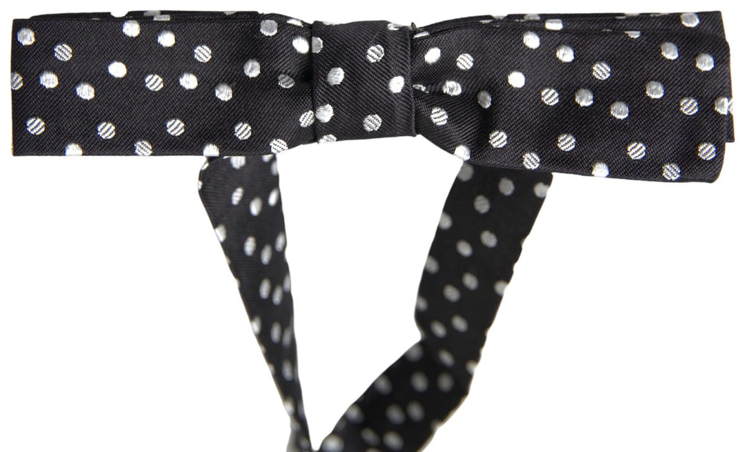 Elegant black silk bow tie with logo detail