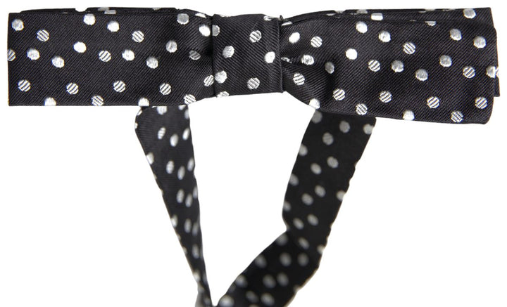 Elegant black silk bow tie with logo detail