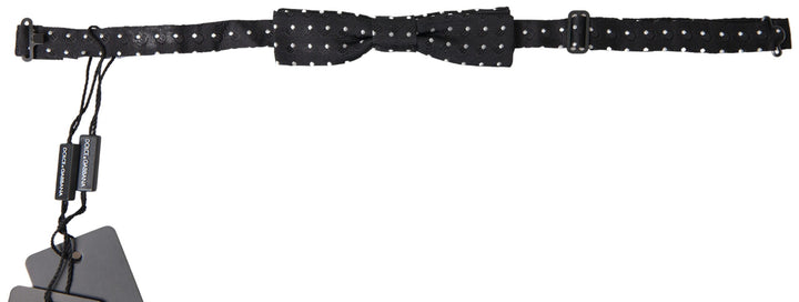 Elegant black silk bow tie with signature clasp