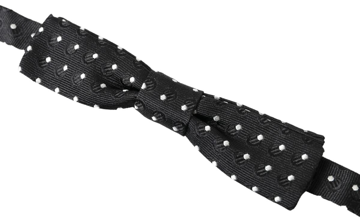 Elegant black silk bow tie with signature clasp