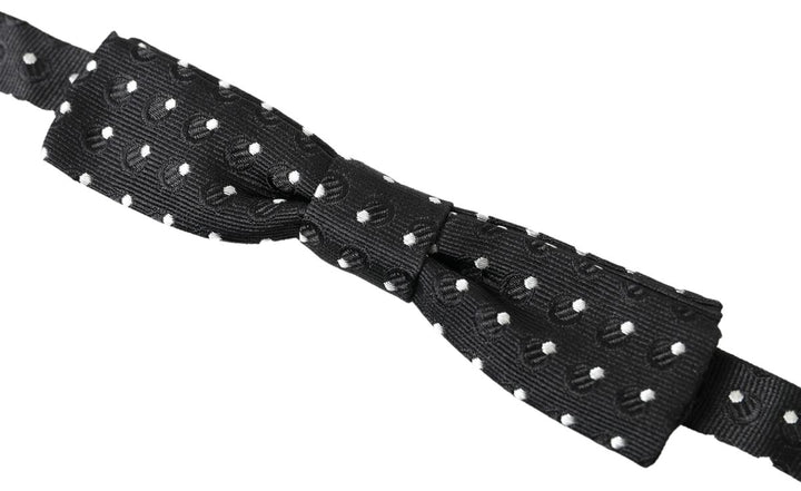 Elegant black silk bow tie with signature clasp