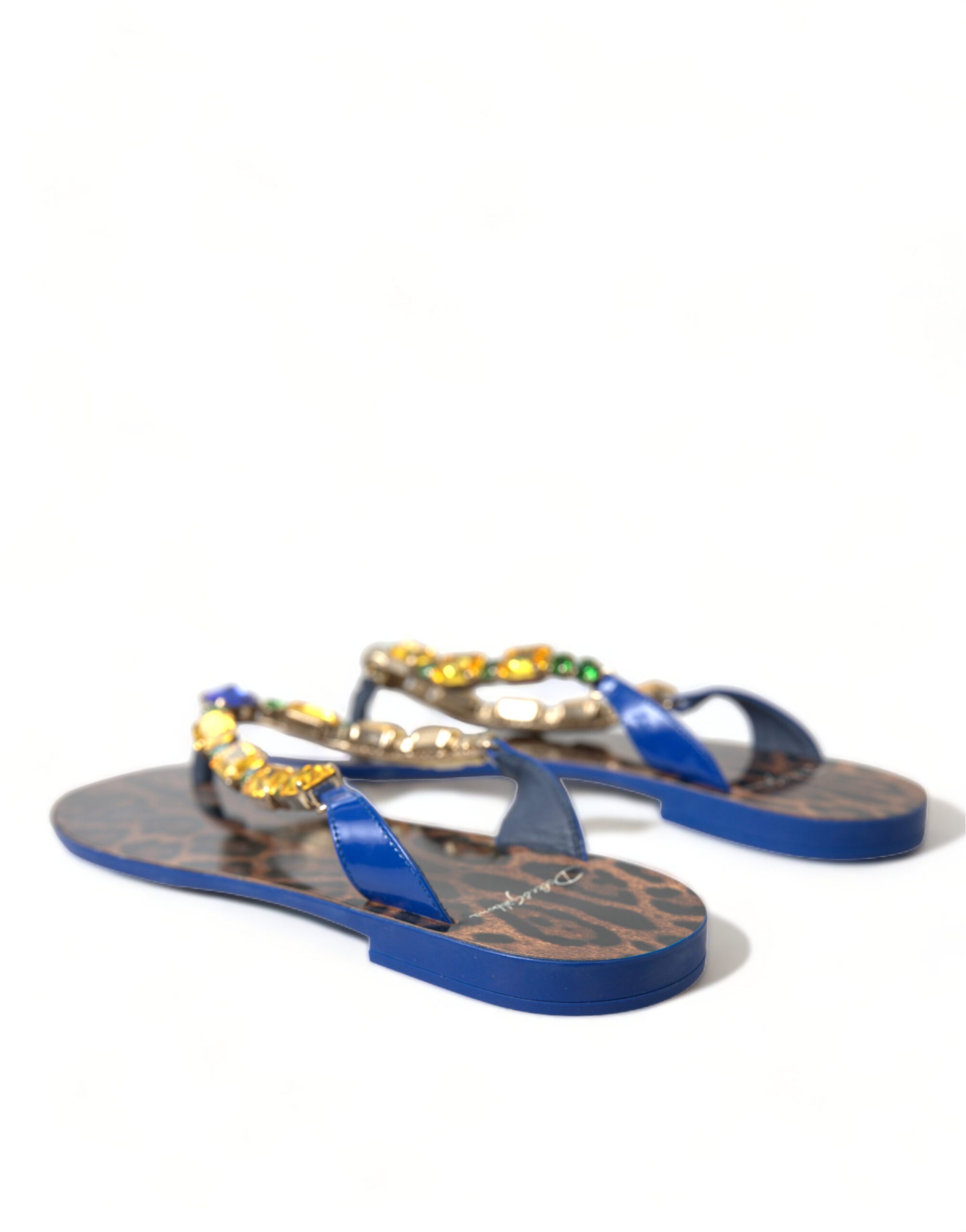 Elegant flat sandals made of blue leather