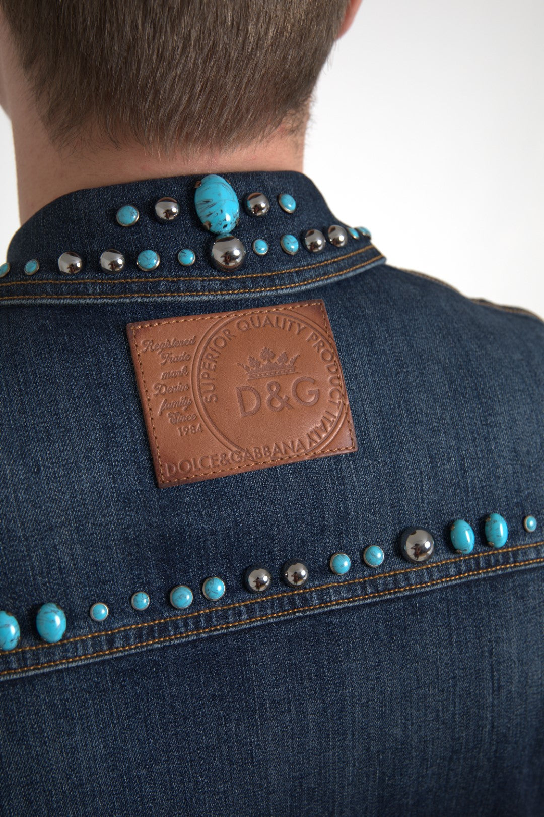Turquoise denim jacket with embellishments