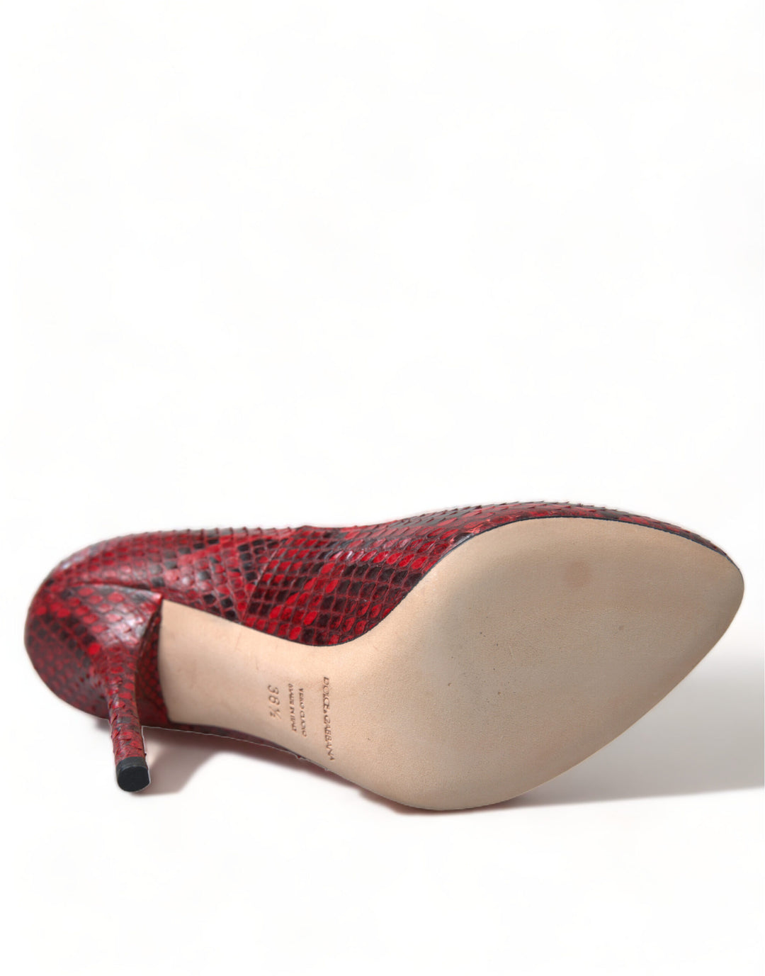 Red snakeskin almond-toe pumps with lace stockings