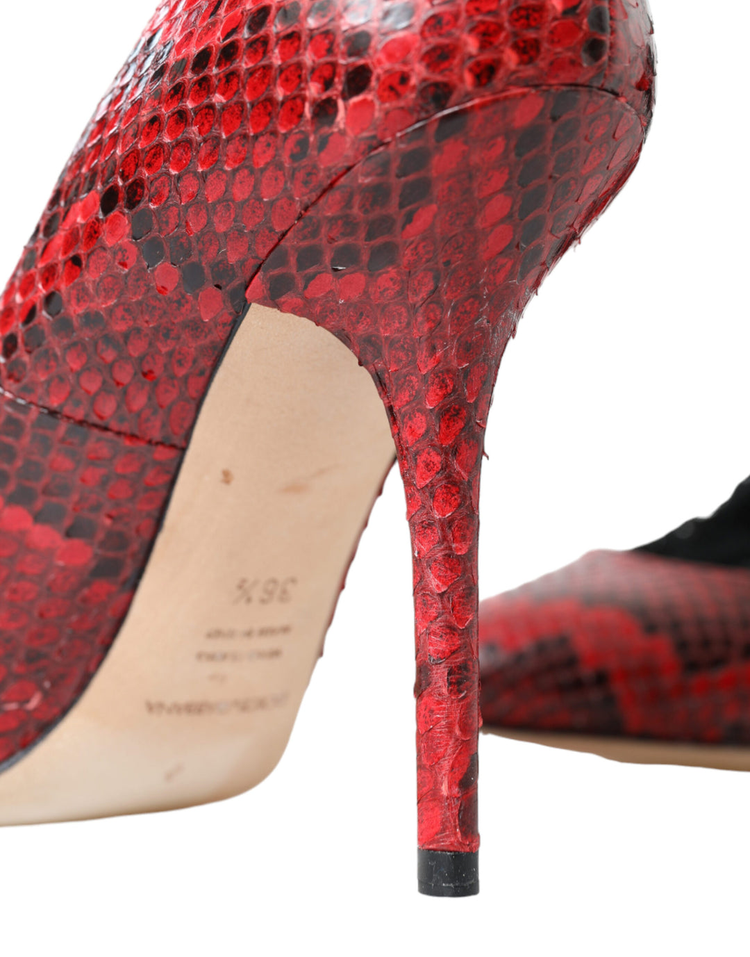 Red snakeskin almond-toe pumps with lace stockings