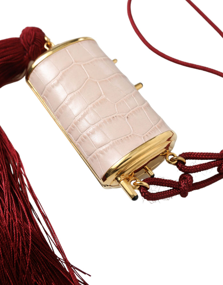 Exotic pink leather mini mirror bag with tassel