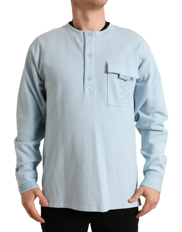 Elegant light blue round neck sweater made from a cotton blend