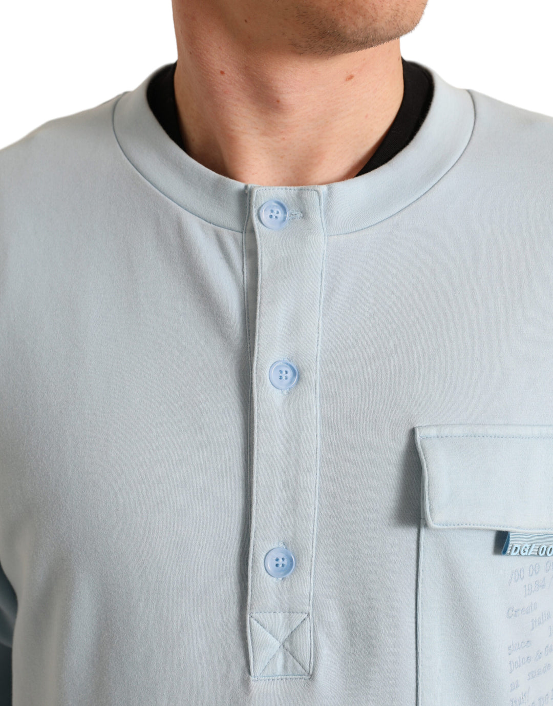 Elegant light blue round neck sweater made from a cotton blend