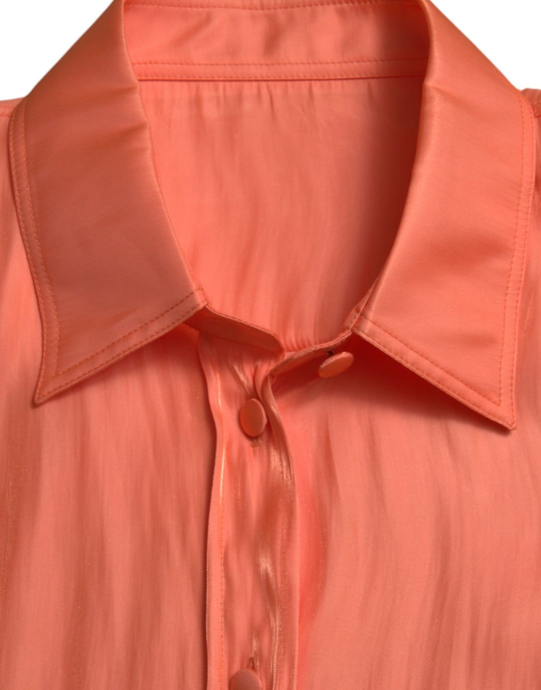 Elegant coral long-sleeved polo top