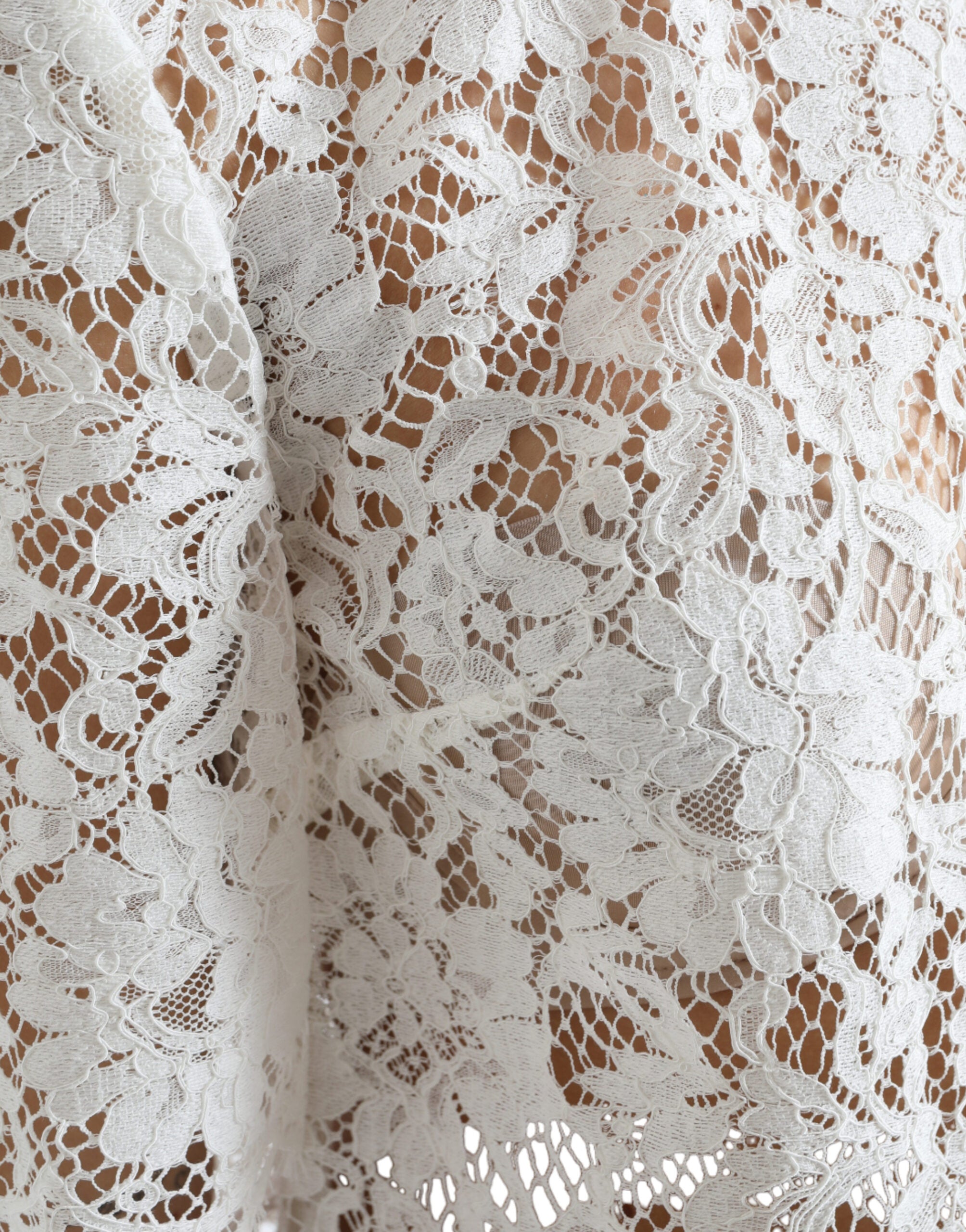 Elegant white lace blouse