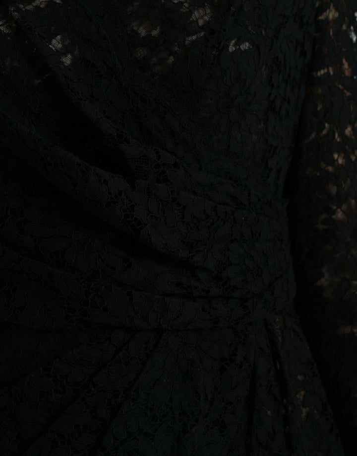 Elegant black mini dress made of floral lace