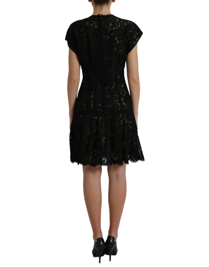 Elegant black A-line mini dress made of floral lace