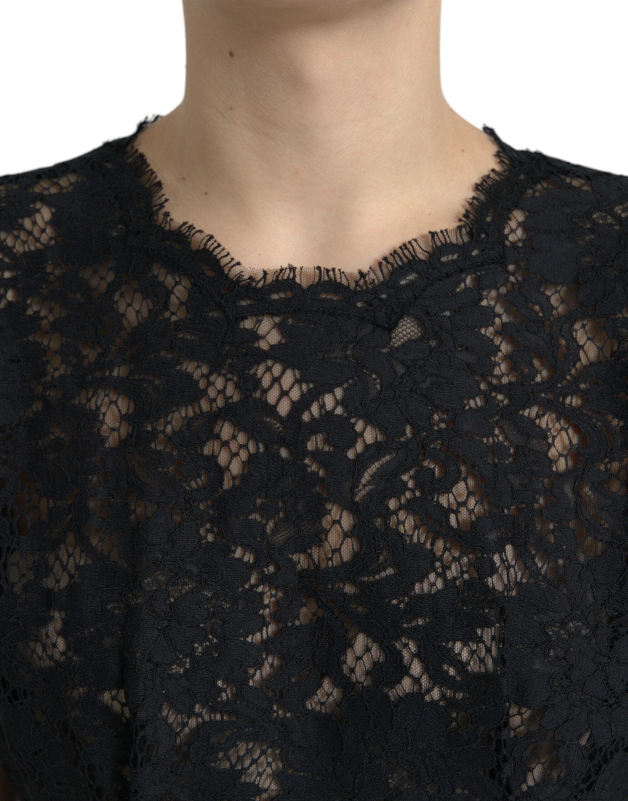 Elegant black A-line mini dress made of floral lace