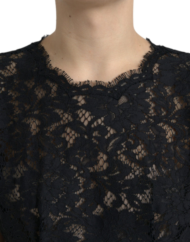 Elegant black A-line mini dress made of floral lace