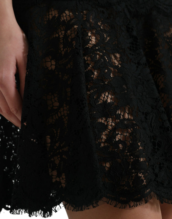 Elegant black A-line mini dress made of floral lace