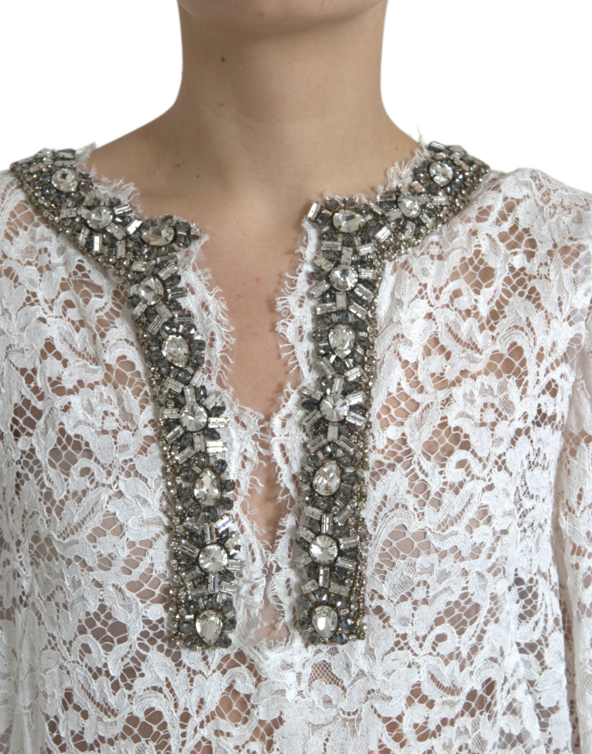 Elegant white sheath dress with crystal embellishment