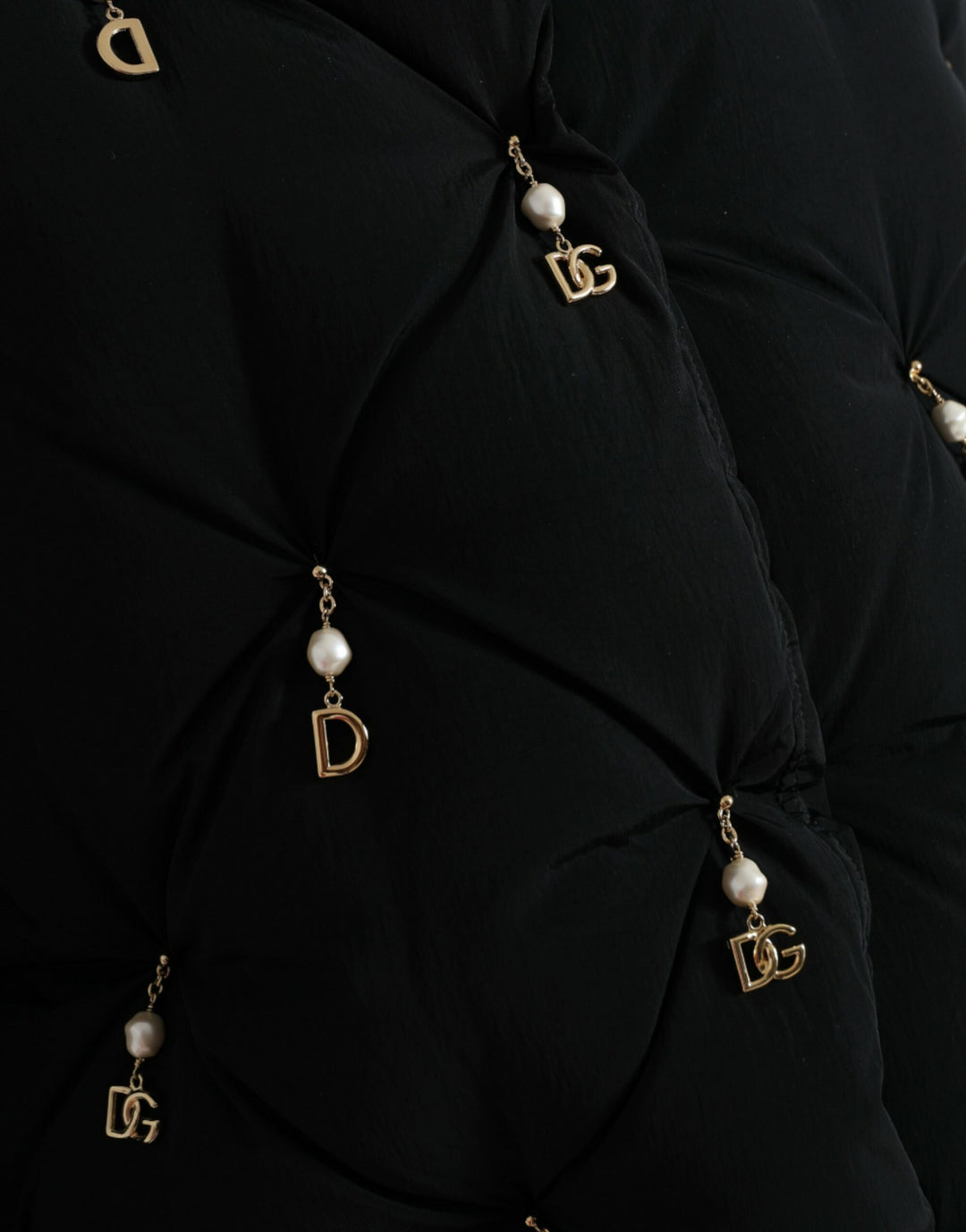 Elegant quilted jacket with pearl decoration