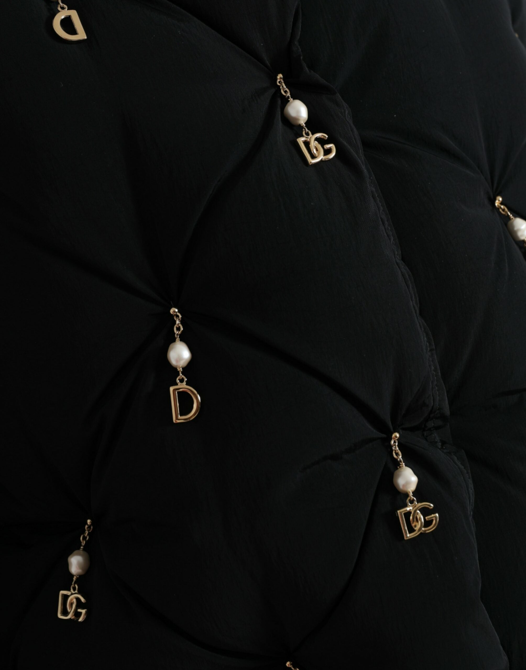Elegant quilted jacket with pearl decoration