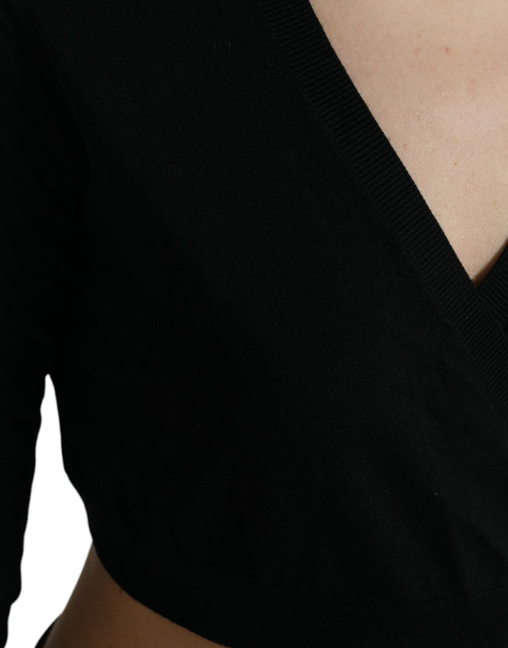 Schwarzer Wollpullover mit V-Ausschnitt und gekreuztem Kragen