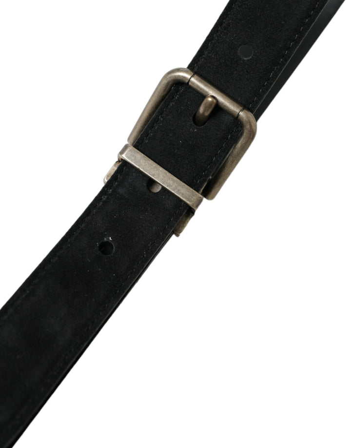 Elegant black leather belt with metal buckle