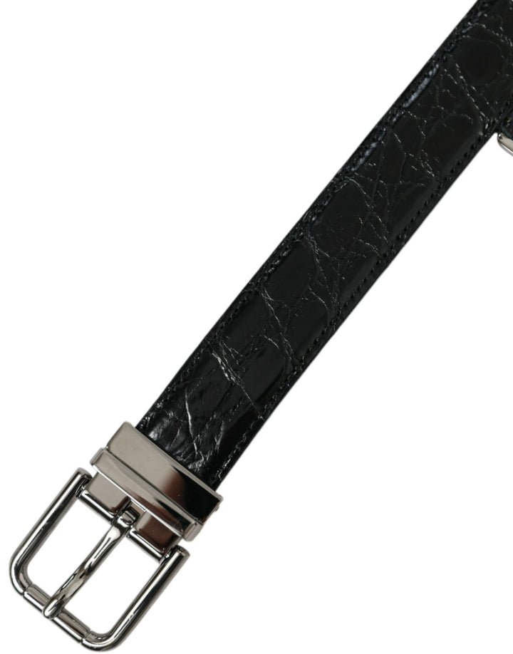 Elegant black leather belt with metal buckle