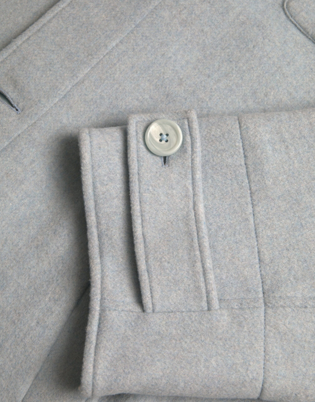 Light blue wool coat with button placket trench coat jacket