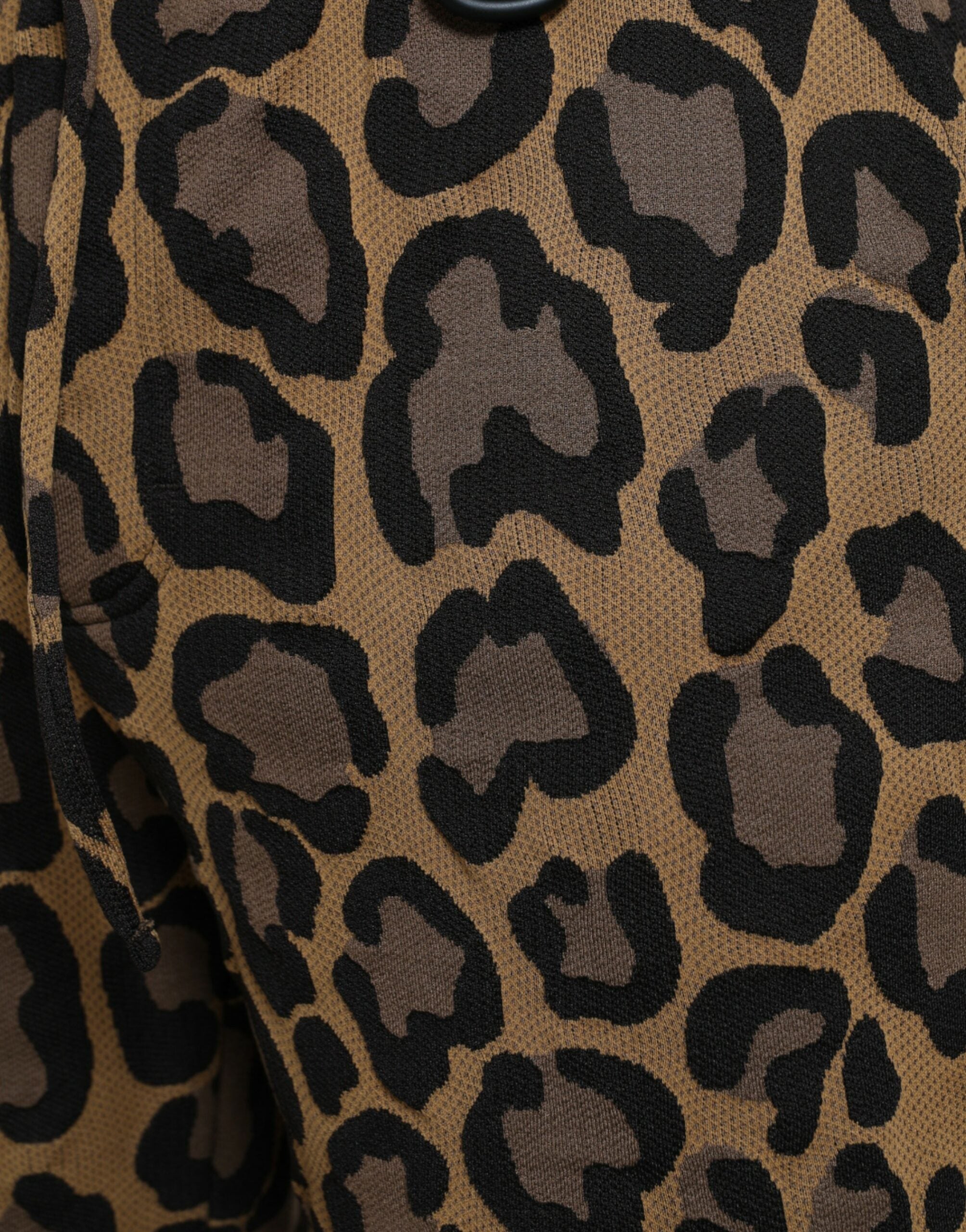 Brown polyester jogger pants with leopard print