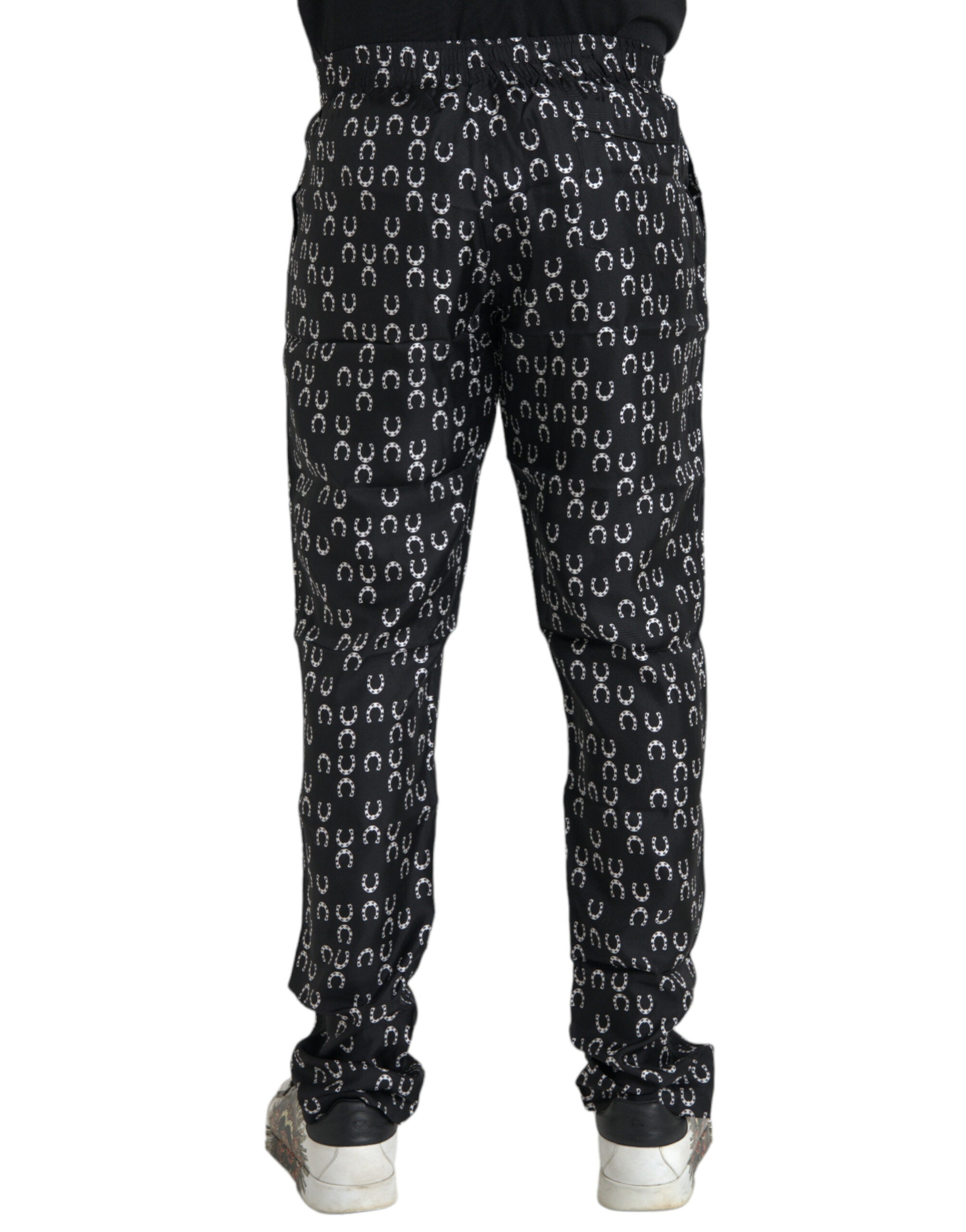 Black silk trousers with horseshoe pattern
