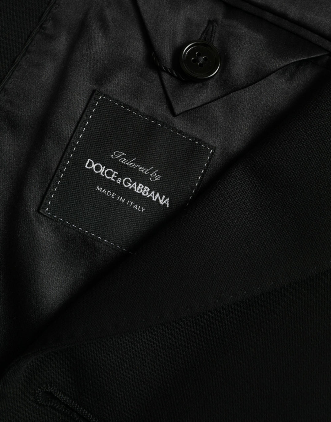 Black single-breasted wool coat with lace blazer