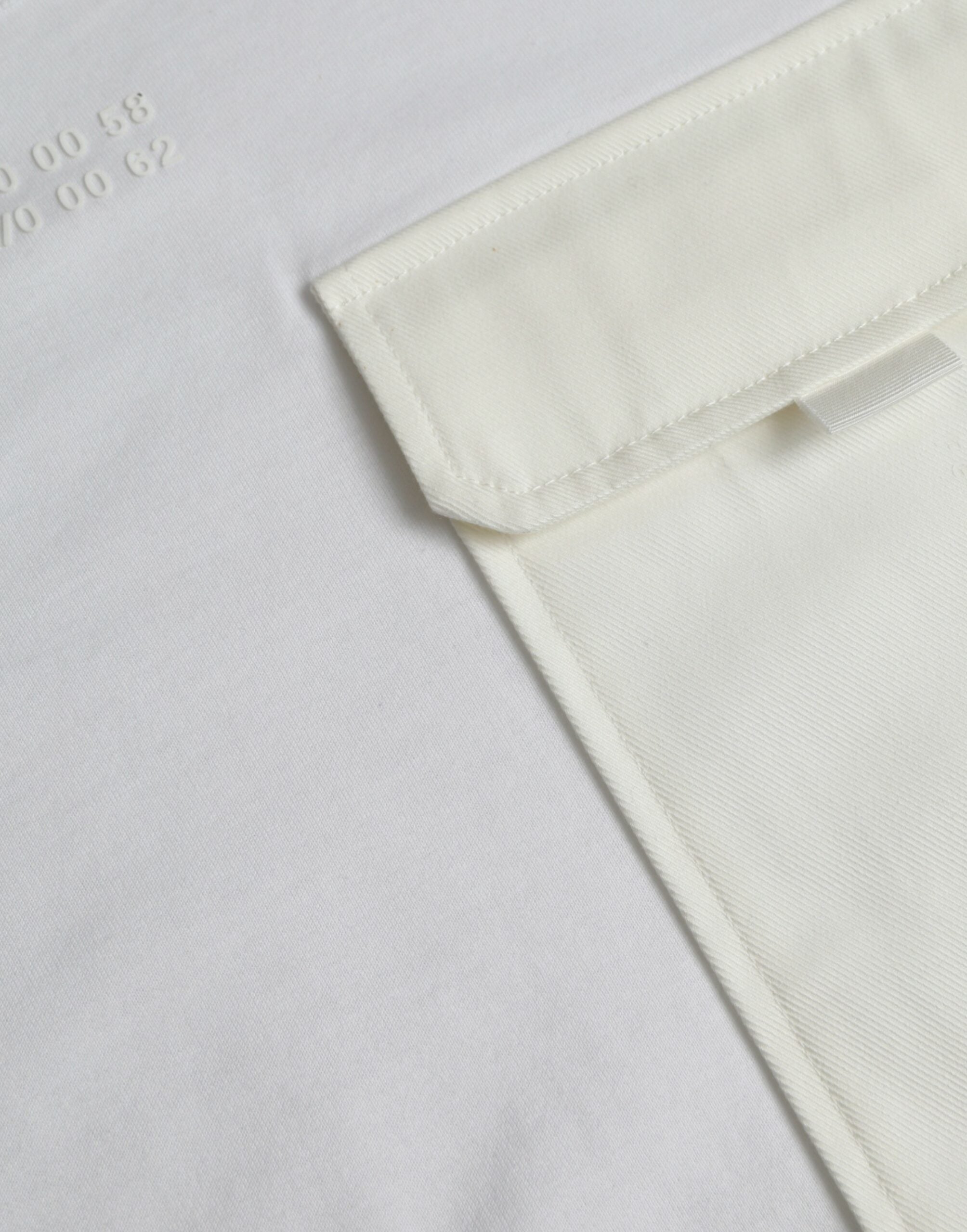 White cotton pocket t-shirt with short sleeves