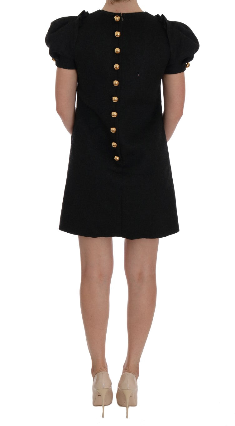 Bezauberndes Midikleid aus Wolle mit Kristallbesatz