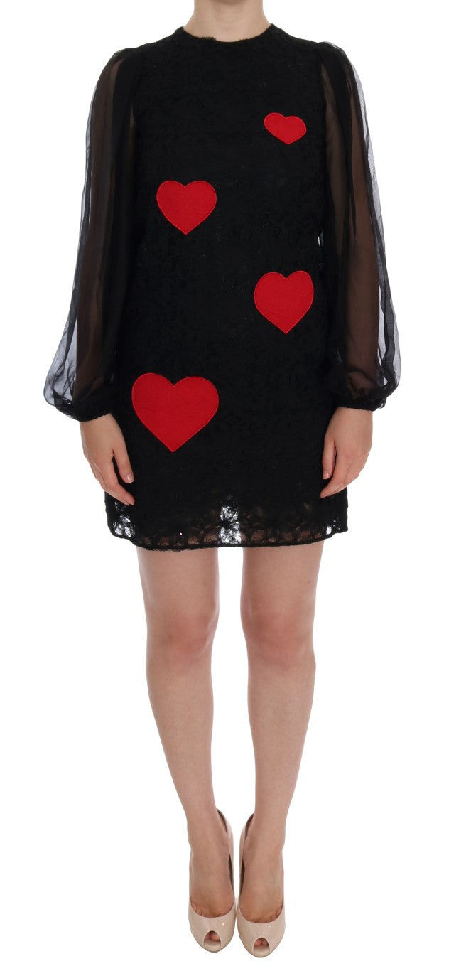 Elegant black shift dress with lace heart appliqué