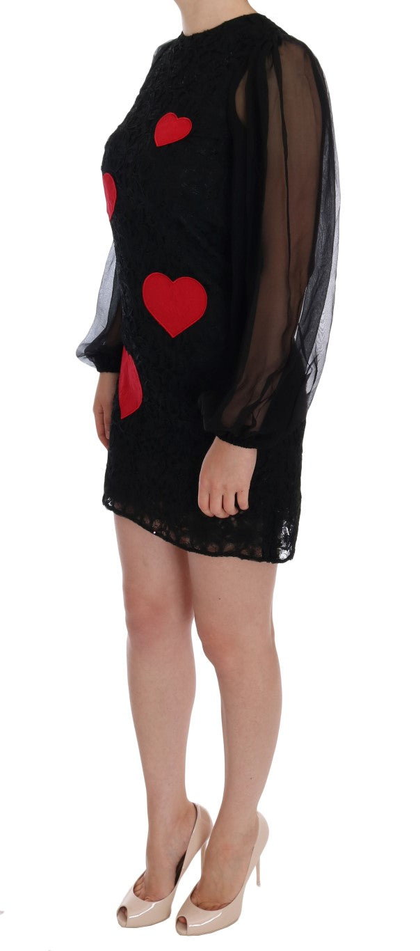 Elegant black shift dress with lace heart appliqué