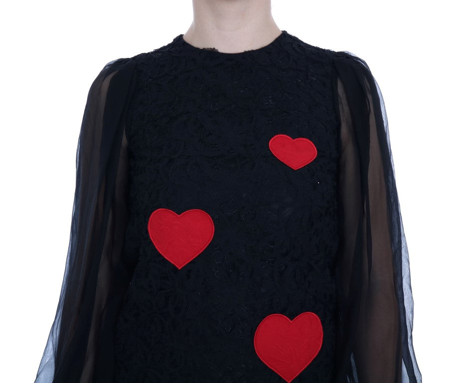 Elegant black shift dress with lace heart appliqué