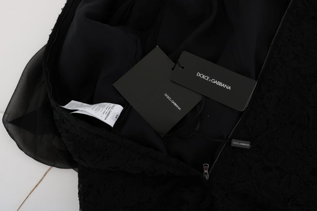 Elegant black shift dress with lace heart appliqué
