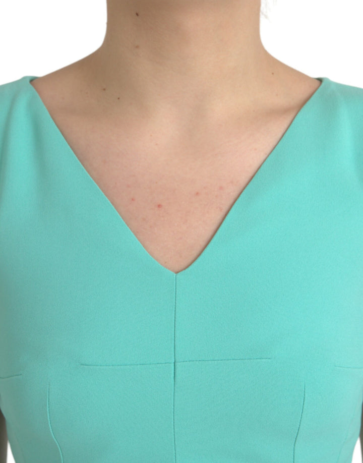 Green sleeveless bodycon midi dress made of viscose