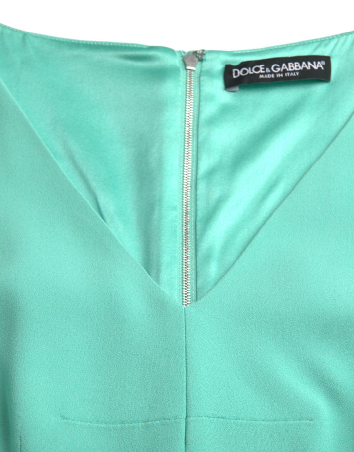 Green sleeveless bodycon midi dress made of viscose