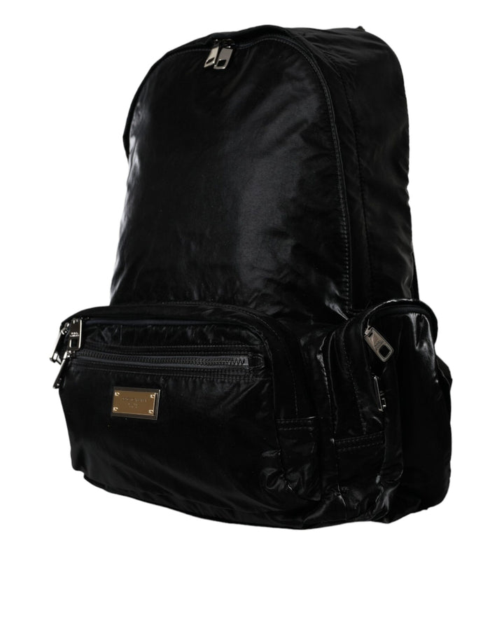 Black patent leather logo plaque backpack bag
