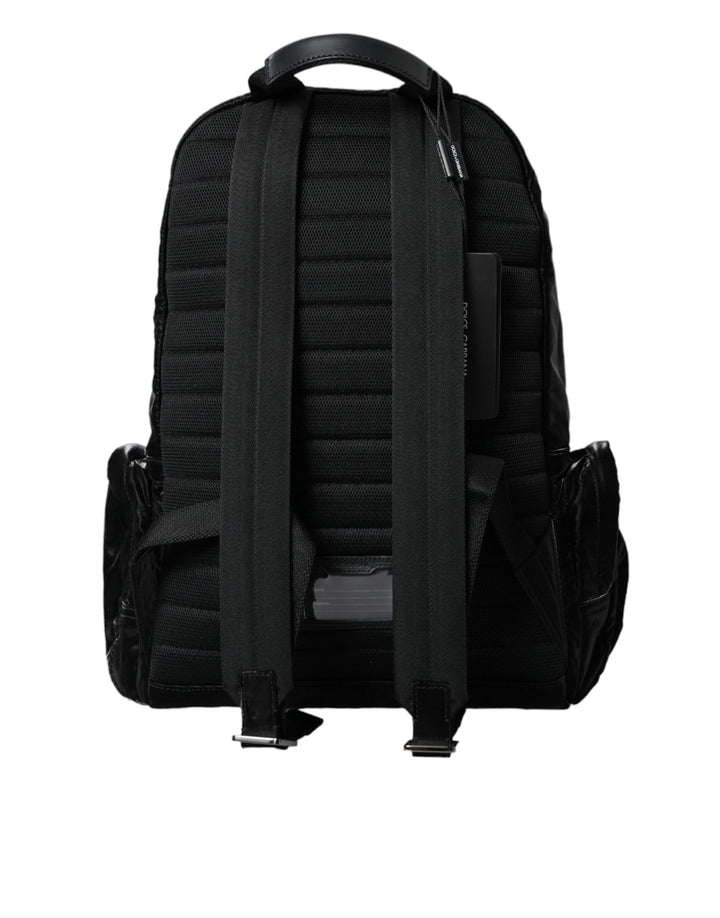 Black patent leather logo plaque backpack bag