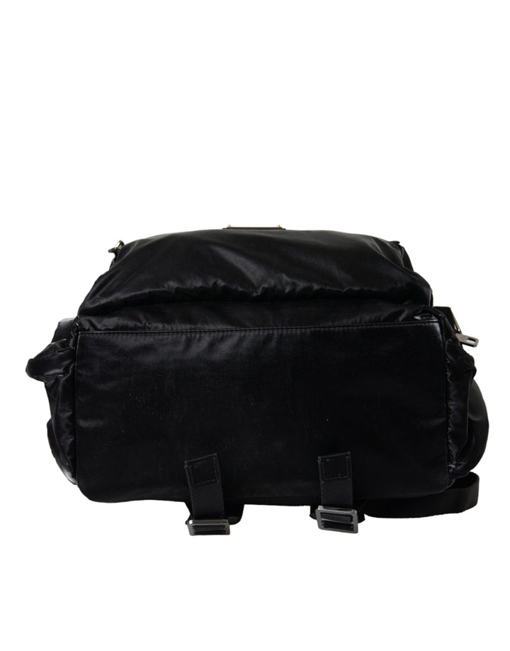 Black patent leather logo plaque backpack bag