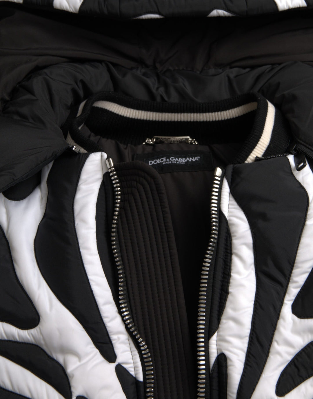 Black and white striped hooded puffer jacket