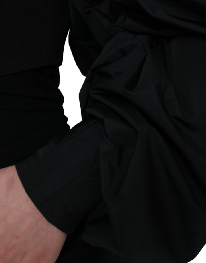 Black polyester jacket with puff sleeves and rolled sleeves